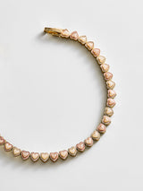 BaubleBar Kali Tennis Bracelet - Pink - 
    Repeating heart tennis bracelet
  
