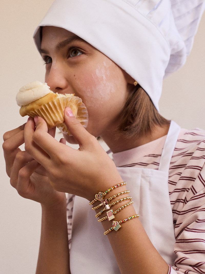 BaubleBar Baker's Choice Kids' Pisa Bracelet Set - Cupcake - 
    Five gold beaded stretch bracelets
  
