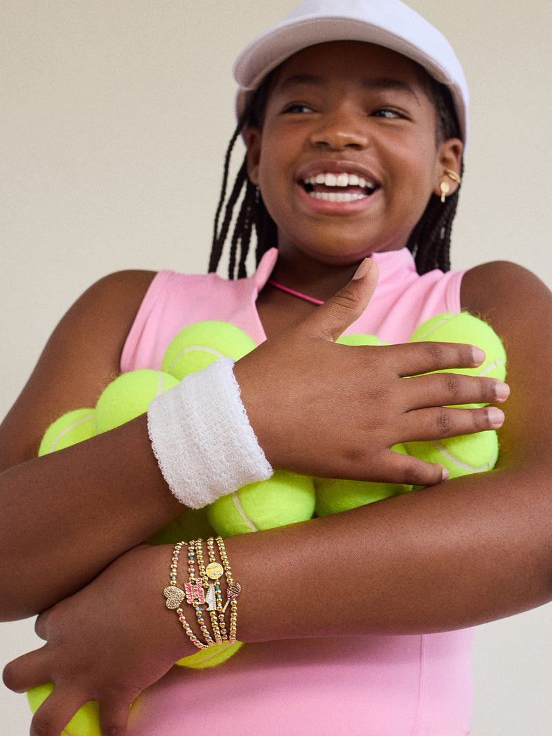 BaubleBar Match Point Kids' Pisa Bracelet Set - Tennis - 
    Five gold beaded stretch bracelets
  
