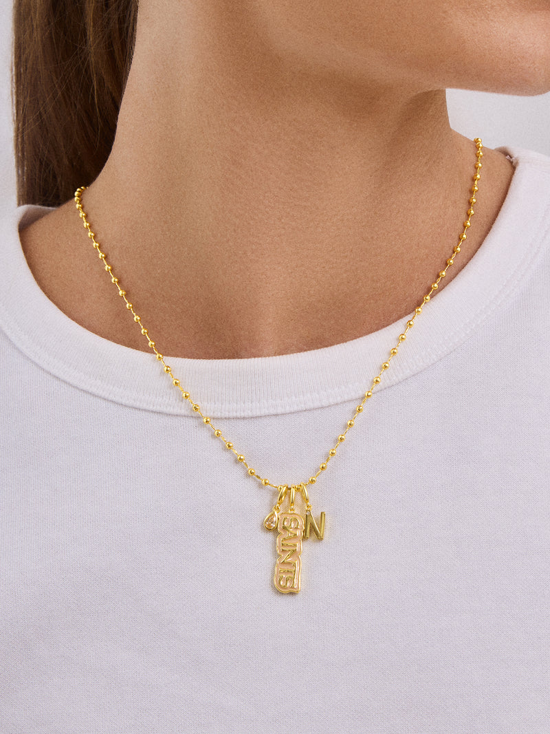 BaubleBar WEAR By Erin Andrews x BaubleBar New Orleans Saints Cluster Charm - New Orleans Saints - 
    NFL cluster charm
  
