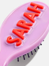 BaubleBar Block Font Mini Custom Hair Brush - Light Purple/Red - 
    Customizable hair brush
  
