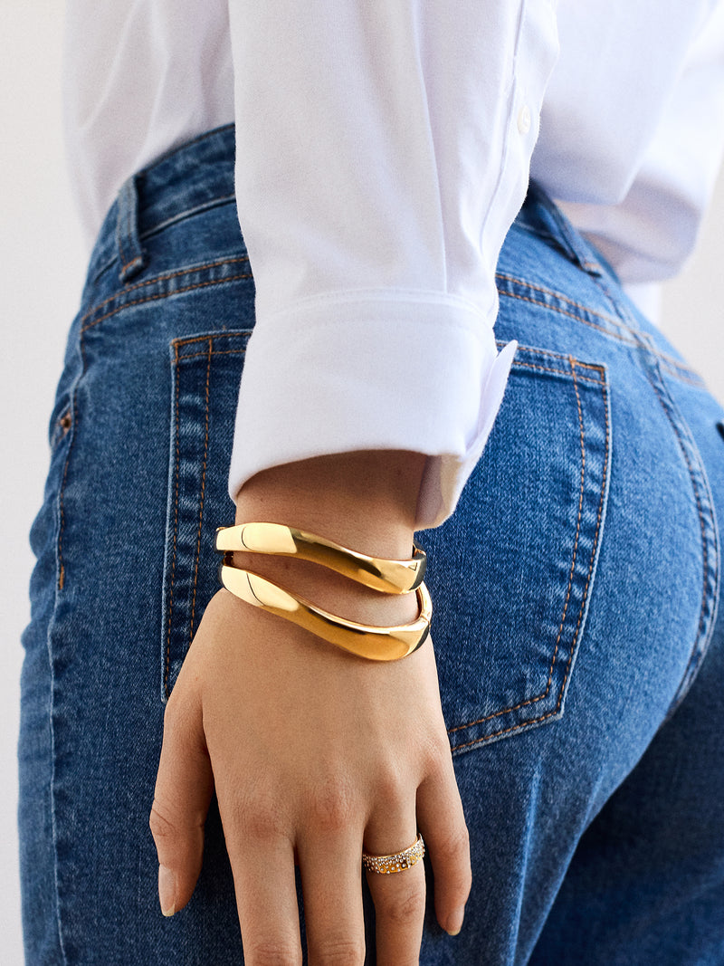 BaubleBar Natalia Wavy Hinge Bangle Set - Gold - 
    2 gold wave bangles
  
