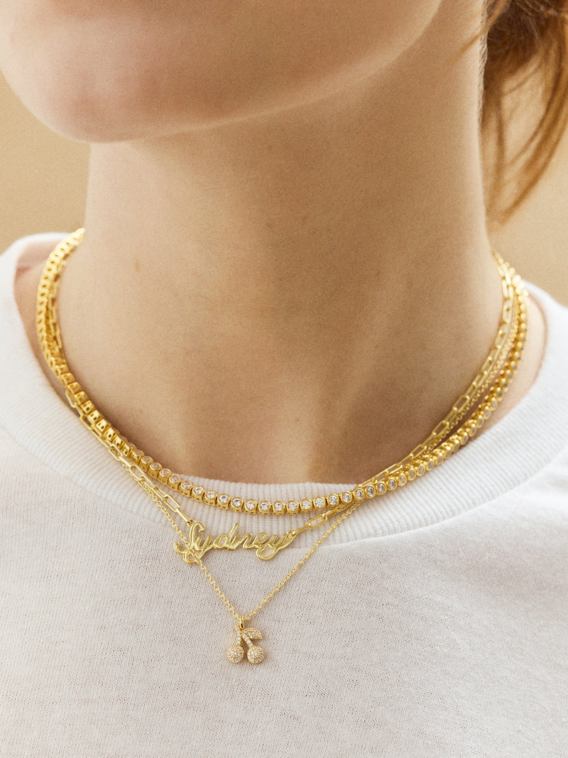 BaubleBar 18K Gold Motif Necklace - Cherry - 
    18K gold plated sterling silver, Cubic Zirconia
  

