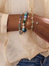 BaubleBar Aisha Evil Eye Bracelet - Gold/Blue - 
    Evil eye pull-tie tennis bracelet 
  
