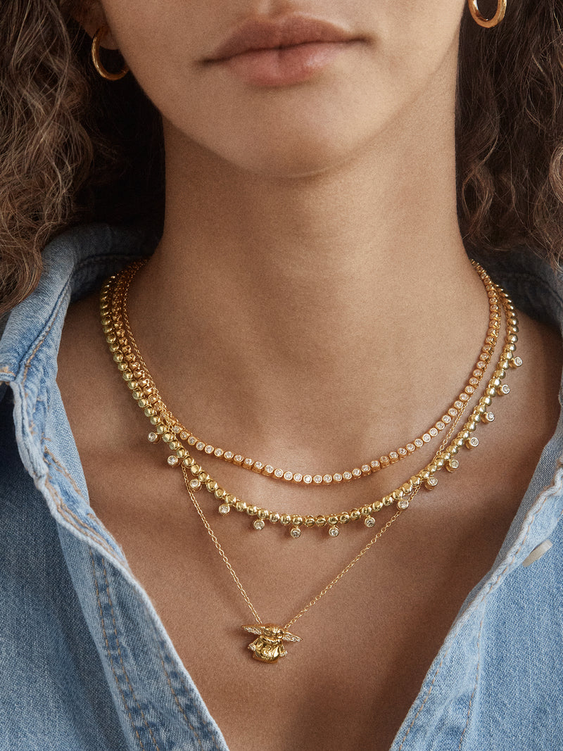 BaubleBar STAR WARS™ GROGU™ 18K Gold Pendant Necklace - Gold - 
    Cubic zirconia necklace on a gold chain 
  
