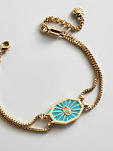 BaubleBar Evil Eye Reversible Bracelet - Gold/Turquoise - 
    Reversible blue and pavé evil eye bracelet
  
