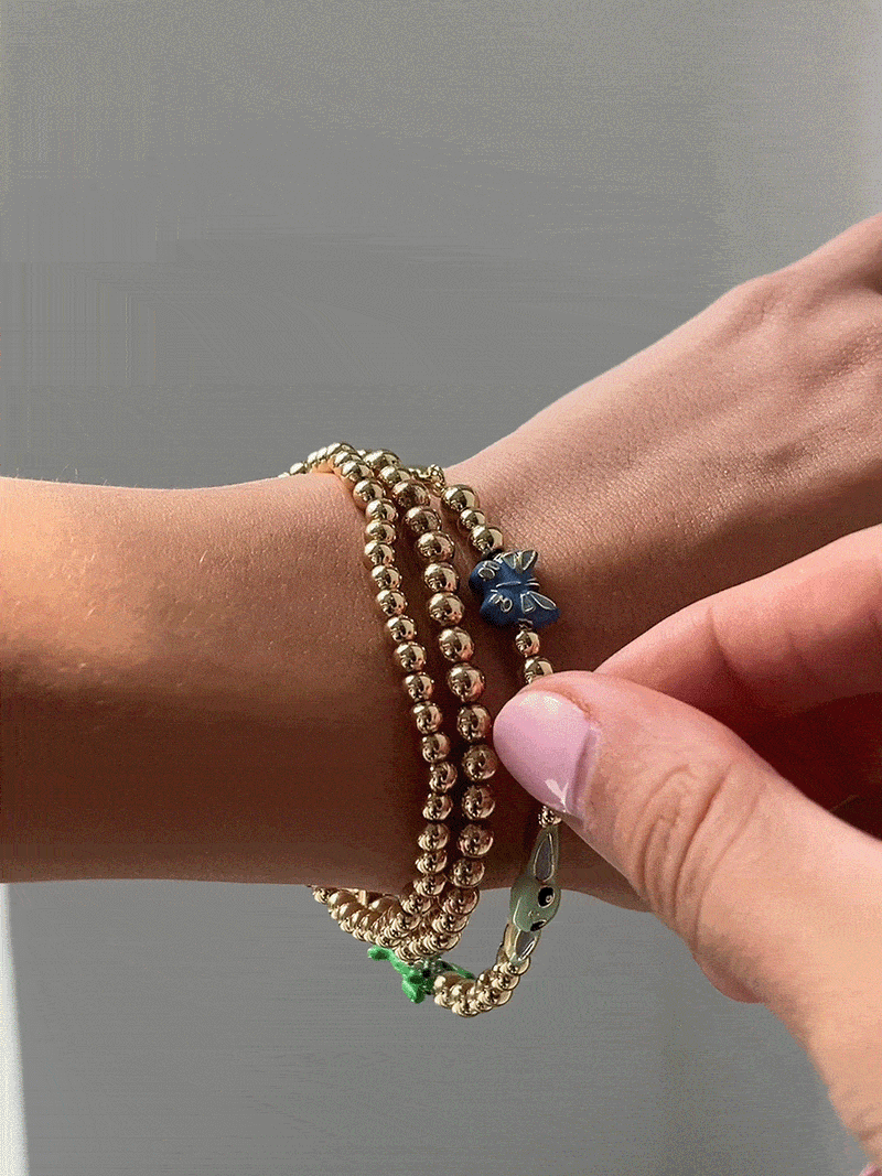 BaubleBar STAR WARS™ GROGU™ Pisa Charm Bracelet - Gold - 
    Gold stacking bracelet 
  

