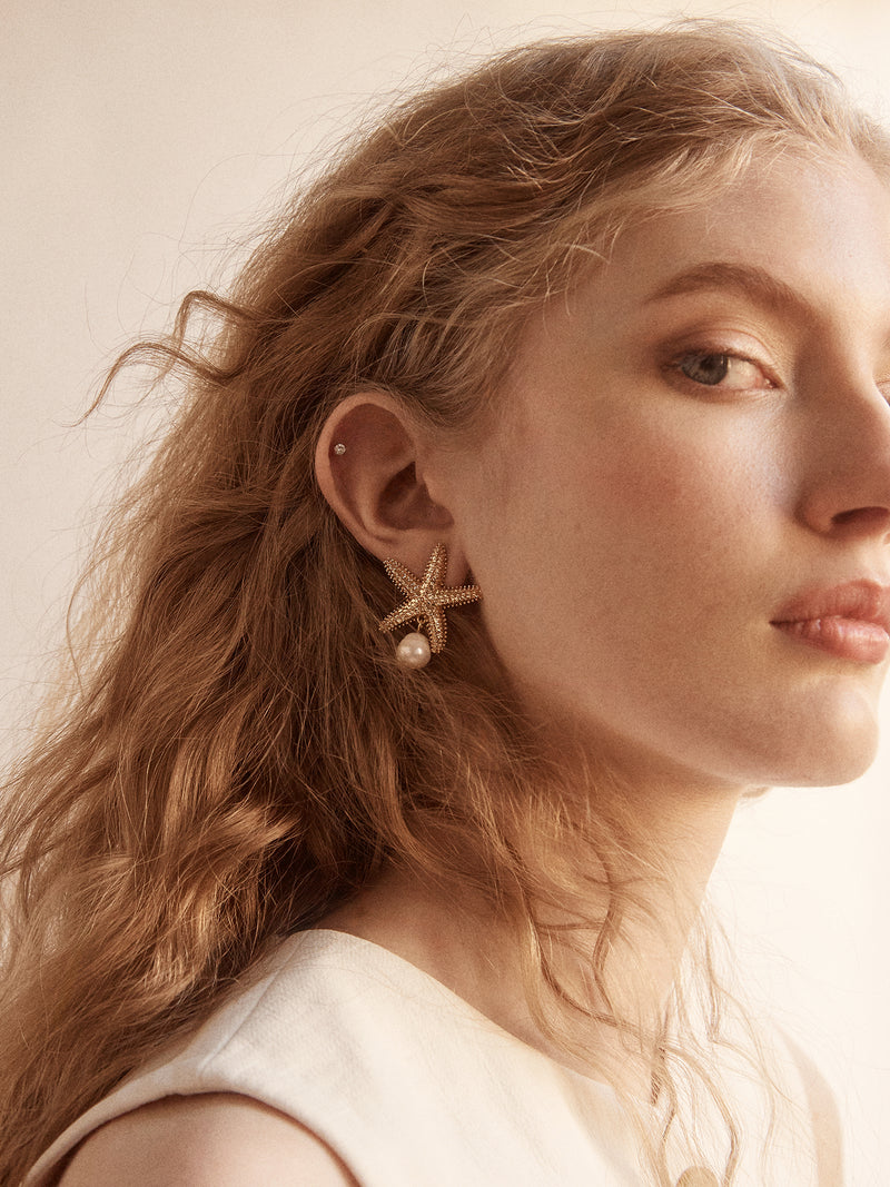BaubleBar Alana Starfish Earrings - Gold/Pearl - 
    Gold statement earrings with pearls
  
