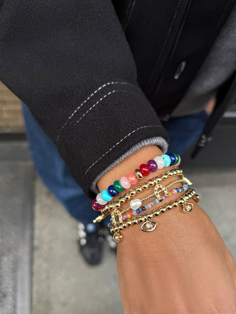 BaubleBar Good Days Pisa Bracelet - Evil Eye - 
    Gold beaded stretch bracelet 
  
