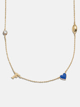 BaubleBar University of Florida Spaced Charm Necklace - University of Florida - 
    Gold necklace with University of Florida charms
  
