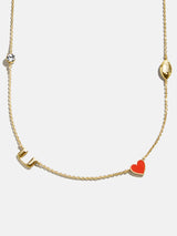 BaubleBar University of Miami Spaced Charm Necklace - University of Miami - 
    Gold necklace with University of Miami charms
  
