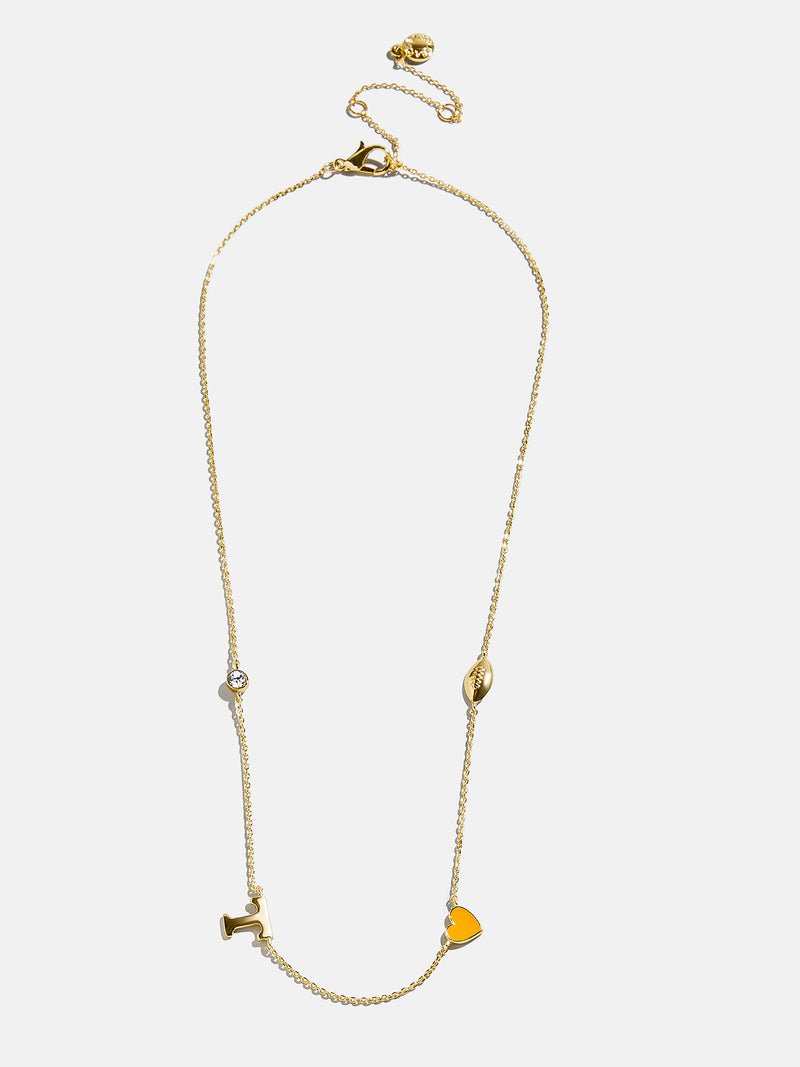 BaubleBar University of Tennessee Spaced Charm Necklace - University of Tennessee - 
    Gold necklace with University of Tennessee charms
  

