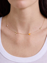 BaubleBar University of Tennessee Spaced Charm Necklace - University of Tennessee - 
    Gold necklace with University of Tennessee charms
  
