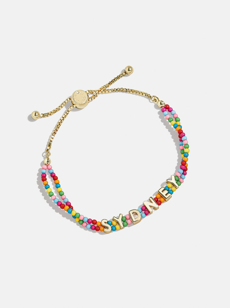 BaubleBar Rainbow Kids’ Custom Nameplate Bracelet  - Multi - 
    Pull-tie beaded bracelet
  
