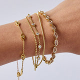 Amanda 18K Gold Tennis Bracelet - Pear Bezel