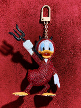 BaubleBar Disney Donald Duck Devil Halloween Bag Charm - Donald Duck Devil - 
    Embellished Disney keychain
  
