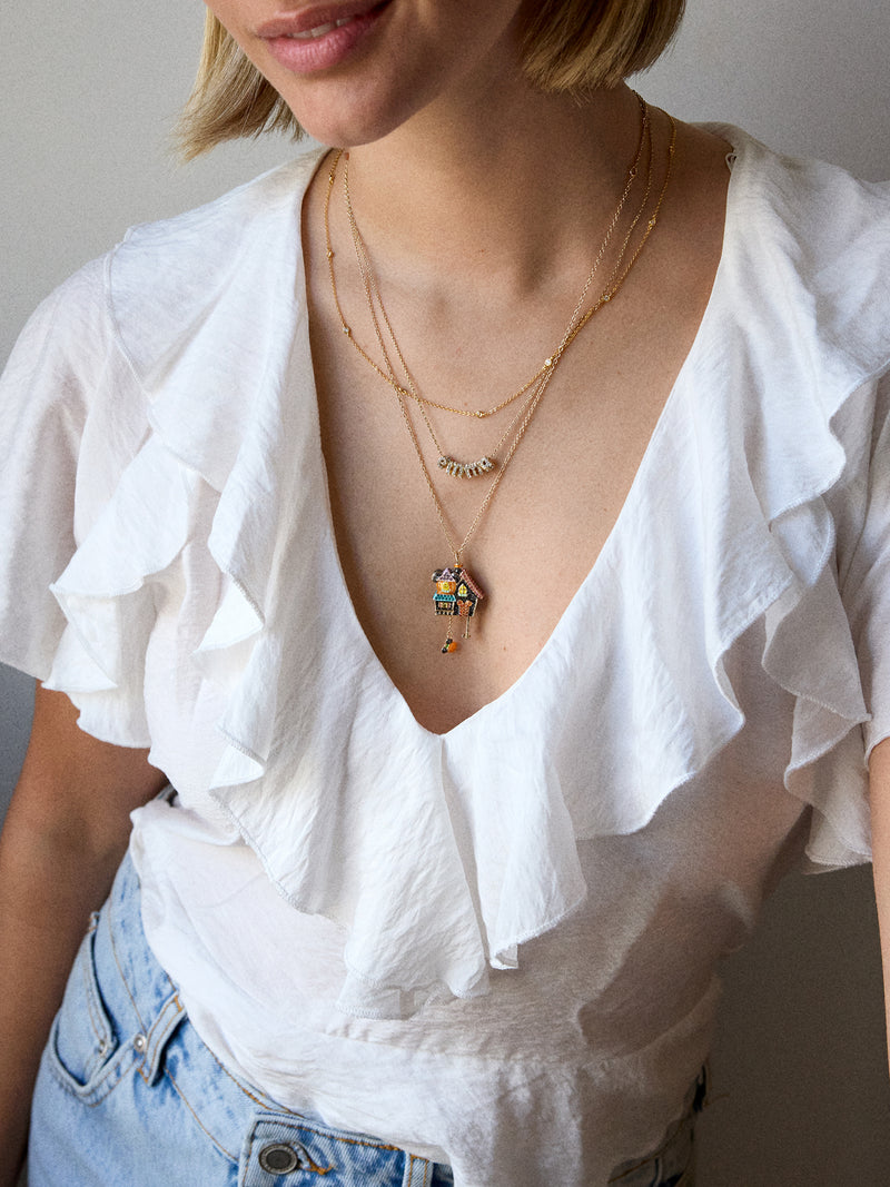 BaubleBar Disney Haunted House Halloween Pendant Necklace - All Hallows' Hue - 
    Gold chain with a 3D Halloween charm 
  
