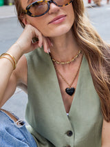 BaubleBar Juno Black Resin Pendant - Black - 
    Heart pendant on a gold chain 
  
