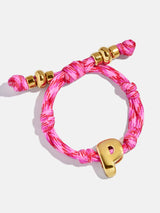 BaubleBar Pink Strawberry - 
    Gold initial waterproof paracord bracelet
  
