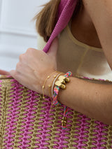 BaubleBar Multi Fruit Salad - 
    Gold initial waterproof paracord bracelet
  
