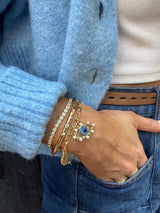 BaubleBar Evil Eye Charm Bracelet - Gold/Blue - 
    Gold chain with evil eye charms 
  

