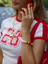 BaubleBar Kansas City Chiefs NFL Beaded Phone Charm - 
    Hands-free wristlet phone strap 
  
