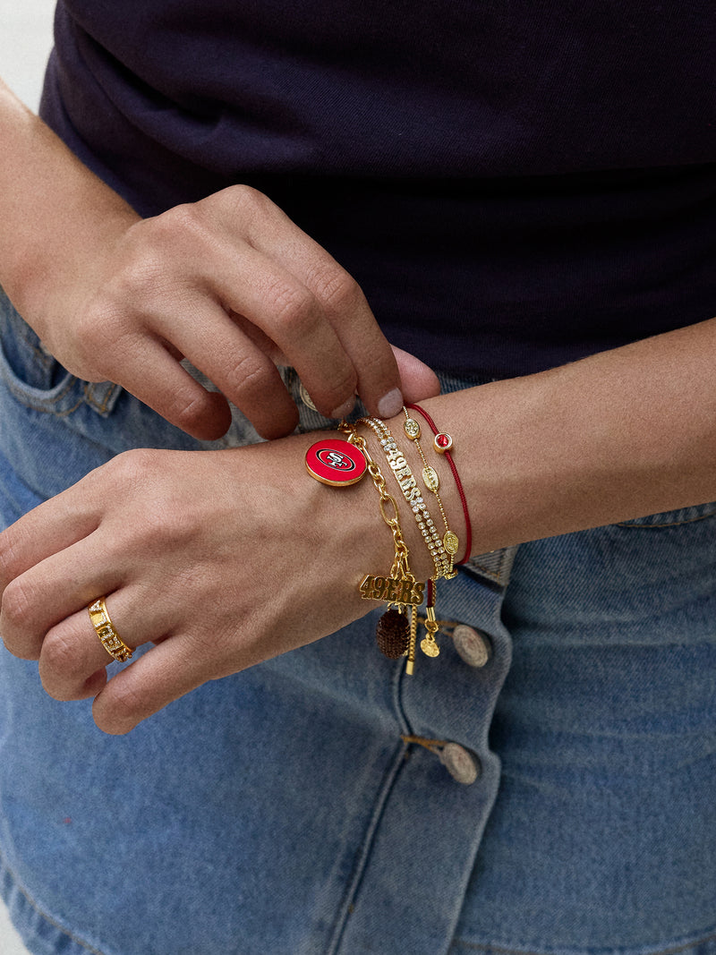 BaubleBar San Francisco 49ers NFL Charm Bracelet - 
    Gold bracelet with charms
  
