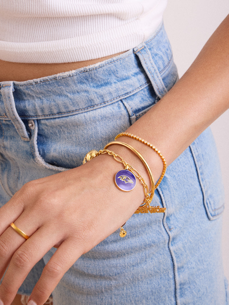 BaubleBar Baltimore Ravens NFL Charm Bracelet - 
    Gold bracelet with charms
  
