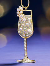 BaubleBar Bubbly and Bright Champagne Ornament - Champagne - 
    Christmas holiday ornament 
  
