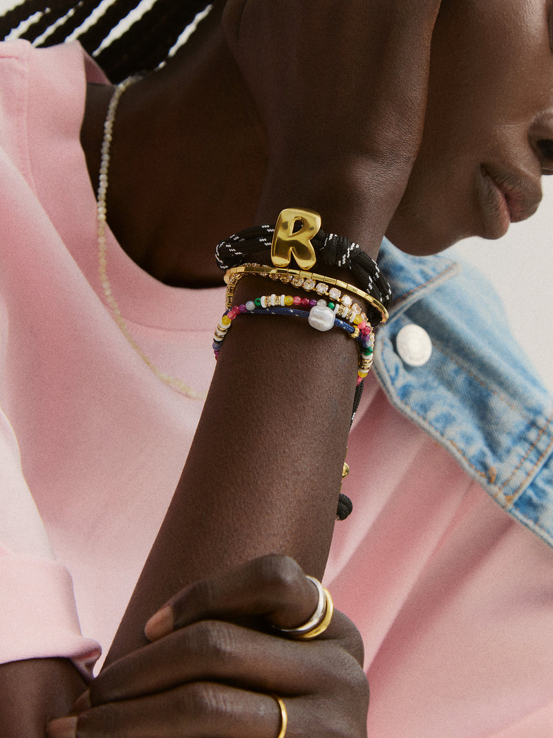 BaubleBar  - 
    Initial waterproof paracord bracelet
  
