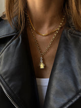 BaubleBar Peanuts Snoopy Flying Ace Doghouse Pendant - Snoopy - 
    Statement pendant on a gold chain 
  
