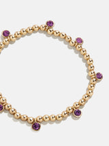 BaubleBar Birthstone Pisa Bracelet - Amethyst - 
    Gold beaded bracelet for stacking
  
