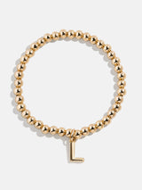 BaubleBar Dangle Charm Initial Pisa Bracelet - Gold - 
    Beaded bracelet for stacking 
  
