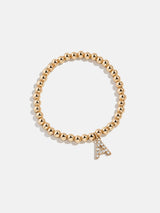 BaubleBar Dangle Charm Initial Pisa Bracelet - Gold/Pavé - 
    Beaded bracelet for stacking 
  
