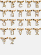 BaubleBar Dangle Charm Initial Pisa Bracelet - Gold/Pavé - 
    Beaded bracelet for stacking 
  
