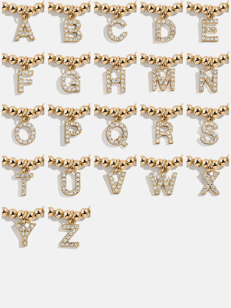 BaubleBar Dangle Charm Initial Pisa Bracelet - Gold/Pavé - 
    Beaded bracelet for stacking 
  
