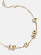 BaubleBar Varsity Number Custom Bracelet - Four Gold Stations - 
    Personalized charm bracelet 
  
