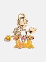 BaubleBar Disney The Lion King Dynamic Duo Bag Charm - Disney The Lion King - 
    Gold keychain with Disney charms
  
