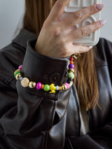 BaubleBar Peanuts Phone Charm - Peanuts Phone Charm - 
    Beaded phone charm
  
