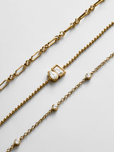 BaubleBar Cosette Waterproof Bracelet Set - Cosette Waterproof Bracelet Set - 
    Set of three gold bracelets 
  
