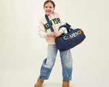 BaubleBar  - 
    Personalized travel bag 
  
