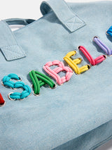 BaubleBar Thready to Go Kids’ Custom Duffle - Light Denim/Multi - 
    Personalized travel bag 
  
