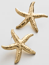 BaubleBar Swept Up Starfish Earrings - Gold - 
    Gold statement earrings 
  
