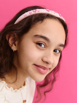 BaubleBar Flower Power Kids' Headband - Pink - 
    Pink headband with flowers 
  
