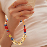 University of Kansas Beaded Bandana Phone Charm - University of Kansas