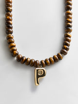 BaubleBar P - 
    Beaded letter necklace


  

