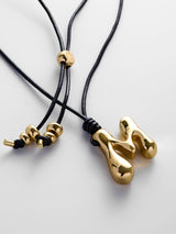 BaubleBar Cord Initial Necklace - Gold - 
    Custom letter necklace
  
