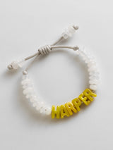 BaubleBar Wear Everywhere Waterproof Custom Bracelet - White Quartz/Yellow - 
    Personalized name bracelet 
  
