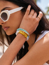 BaubleBar Wear Everywhere Waterproof Custom Bracelet - White Quartz/Yellow - 
    Personalized name bracelet 
  
