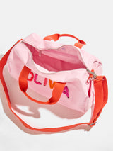 BaubleBar Thready to Go Kids' Custom Duffle - Pink/Red Multi - 
    Children's day bag
  
